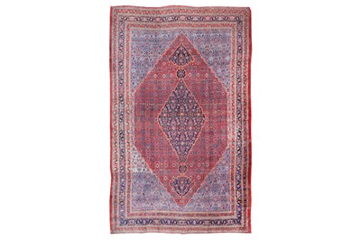Lot 34 - A FINE ANTIQUE BIJAR CARPET, NORTH-WEST PERSIA...