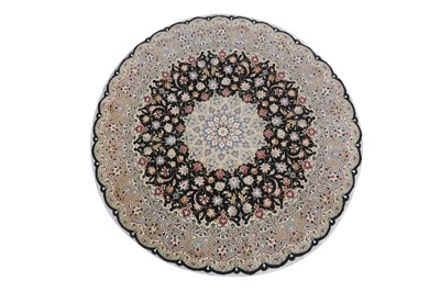 Lot 45 - A VERY FINE PART SILK TABRIZ CIRCULAR CARPET,...