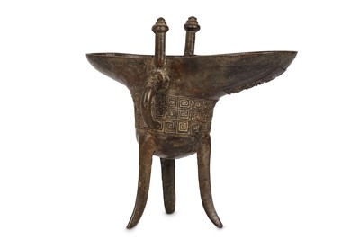 Lot 850 - A CHINESE BRONZE RITUAL VESSEL, JUE. Qing...