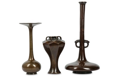 Lot 1033 - THREE BRONZE VASES. 19th Century. The first...