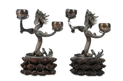 Lot 118 - TWO CHINESE SILVER 'DRAGON' CANDLE STICKS....