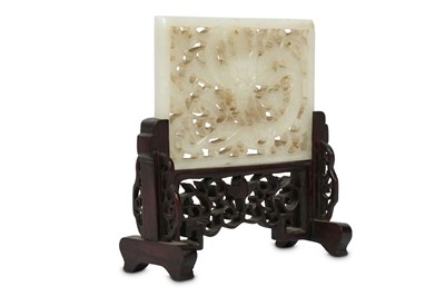 Lot 136 - A CHINESE PALE CELADON JADE RETICULATED...