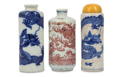Lot 13 - TWO CHINESE BLUE AND WHITE AND ONE UNDERGLAZE RED 'DRAGON' SNUFF BOTTLES.