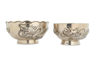 Lot 196 - TWO CHINESE SILVER ‘DRAGON’ BOWLS. Early 20th...