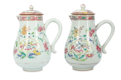 Lot 601 - A PAIR OF CHINESE FAMILLE ROSE JUGS AND COVERS....