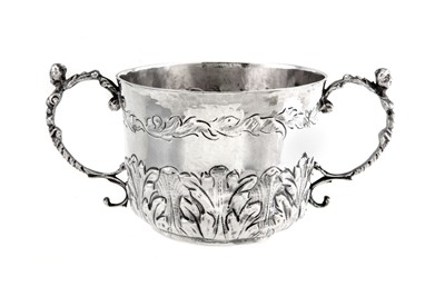 Lot 326 - A Charles II sterling silver twin handled...