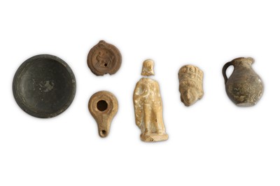 Lot 128 - A GROUP OF ANCIENT TERRACOTTA PIECES  Circa...