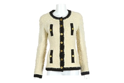 Lot 559 - Chanel Boutique Cream Knitted Jacket, black...