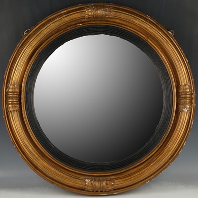 Lot 193 - A Regency style concave ‘porthole’ mirror, rib...