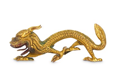 Lot 117 - A CHINESE GILT-COPPER DRAGON. Ming Dynasty....