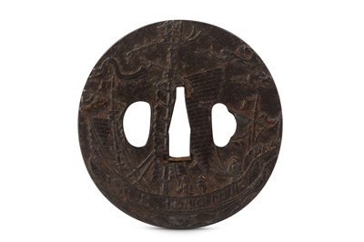 Lot 1013 - AN IRON NAMBAN TSUBA. Edo period. A circular...