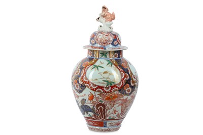 Lot 1044 - AN IMARI VASE AND COVER. 18th Century. The...