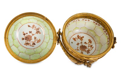 Lot 441 - TWO CHINESE CELADON-GLAZED BOWLS. Qing Dynasty,...