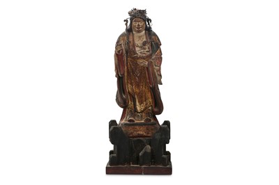 Lot 1026 - A CARVED WOOD FIGURE OF A DEITY. Edo period....