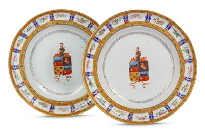 Lot 140 - A PAIR OF CHINESE FAMILLE ROSE ARMORIAL DISHES.