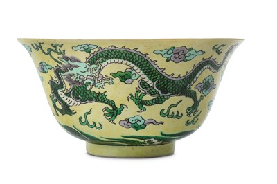Lot 162 - A CHINESE FAMILLE VERTE BISCUIT ‘DRAGON’ BOWL....