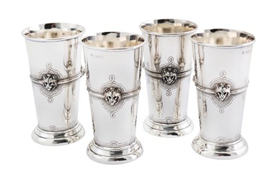 Lot 313 - A set of four Edwardian sterling silver...
