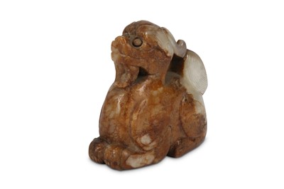 Lot 216 - A CHINESE JADE CARVING OF A MYTHICAL BEAST....