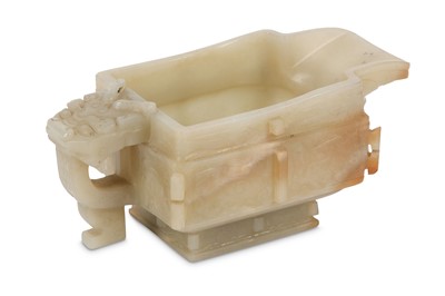 Lot 217 - A CHINESE JADE POURING VESSEL. Qing Dynasty....