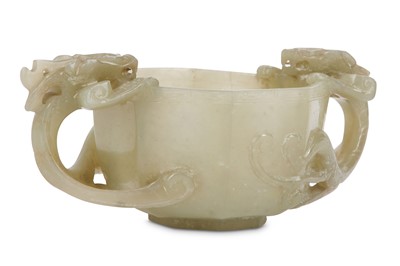 Lot 221 - A CHINESE JADE CUP WITH TWO DRAGON HANDLES....