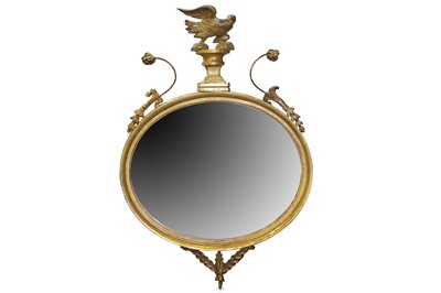 Lot 345 - A Regency style gilt oval mirror surmounted by...