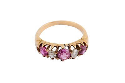 Lot 18 - A pink sapphire and diamond ring, The...