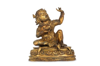 Lot 967 - A TIBETAN GILT-BRONZE BUDDHIST FIGURE OF...