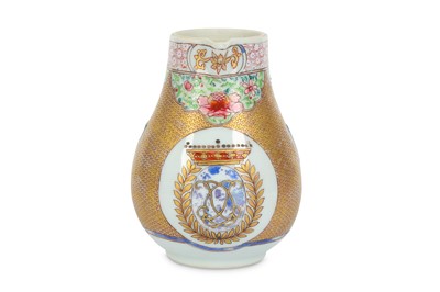 Lot 514 - A CHINESE FAMILLE ROSE ARMORIAL CREAM JUG....