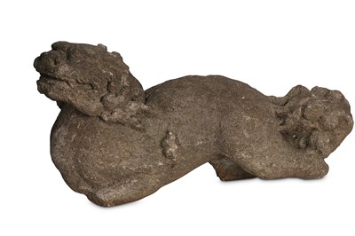 Lot 338 - A CHINESE STONE CARVED BUDDHIST LION DOG. Ming...
