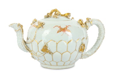 Lot 545 - A CHINESE ‘LOTUS’ TEAPOT AND COVER. Qing...
