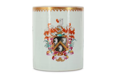 Lot 512 - A CHINESE FAMILLE ROSE ARMORIAL MUG. Qing...
