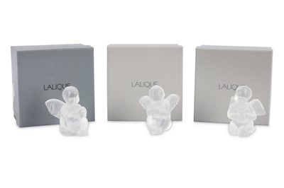 Lot 230 - Lalique Crystal- A set of three moulded and...