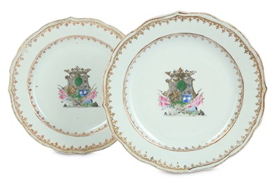 Lot 563 - A PAIR OF CHINESE FAMILLE ROSE ARMORIAL DISHES....