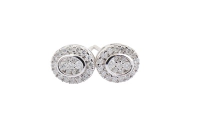 Lot 25 - A pair of diamond-set earrings, Each oval...