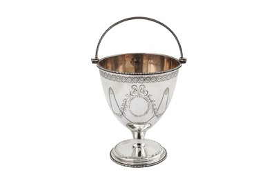 Lot 318 - A George III sterling silver sugar basket,...
