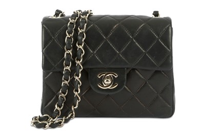 Lot 631 - Chanel Black Mini Flap Bag, c. 1997-99,...