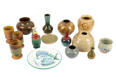 Lot 573 - A collection of sixteen pottery vases and two dishes