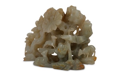 Lot 905 - A CHINESE PALE CELADON JADE 'DEER' CARVING....