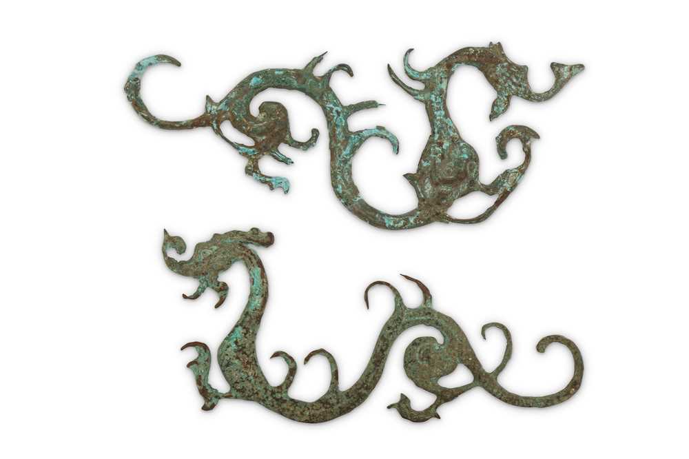 Lot 116 - A PAIR OF CHINESE BRONZE 'DRAGON' FITTINGS....