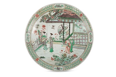 Lot 197 - A Chinese famille verte figurative dish,...