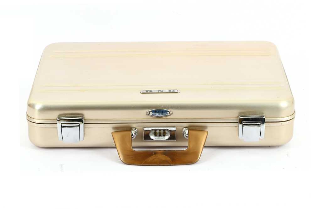 Lot 287 - A Zero Halliburton rose gold attache case,...