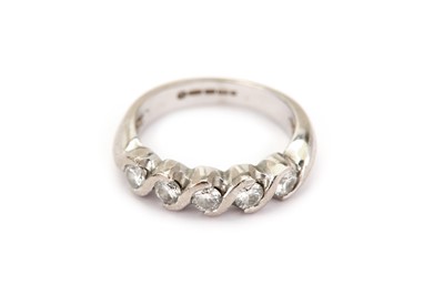 Lot 391 - A diamond five-stone ring, Set with...