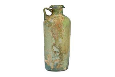 Lot 138 - A ROMAN GREEN GLASS JUG Circa 2nd - 3rd...