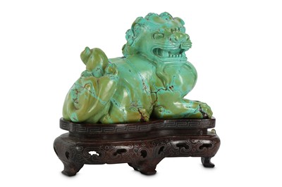 Lot 753 - A CHINESE TURQUOISE ‘LION DOG’ GROUP.  The...