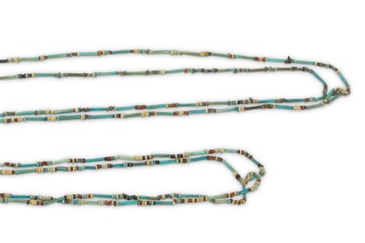 Lot 61 - TWO EGYPTIAN MUMMY BEAD NECKLACES  Late Period,...