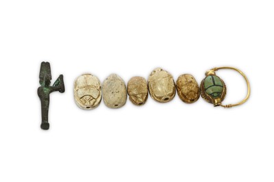 Lot 60 - A GROUP OF EGYPTIAN SCARABS Third Intermediate...
