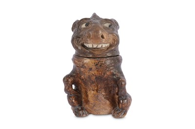 Lot 134 - A Martin Brothers stoneware grotesque jar and...