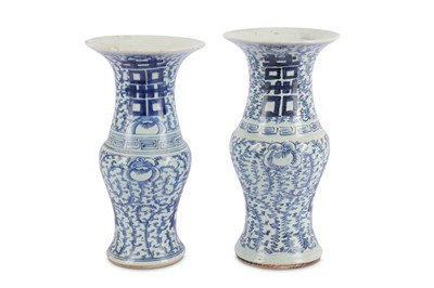 Lot 201 - A pair of Chinese blue and white vases of...