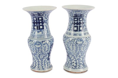 Lot 201 - A pair of Chinese blue and white vases of...