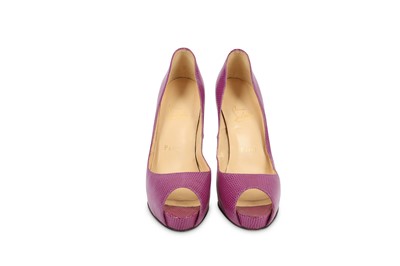 Lot 426 - Christian Louboutin Fuchsia Lizard Heels, peep...